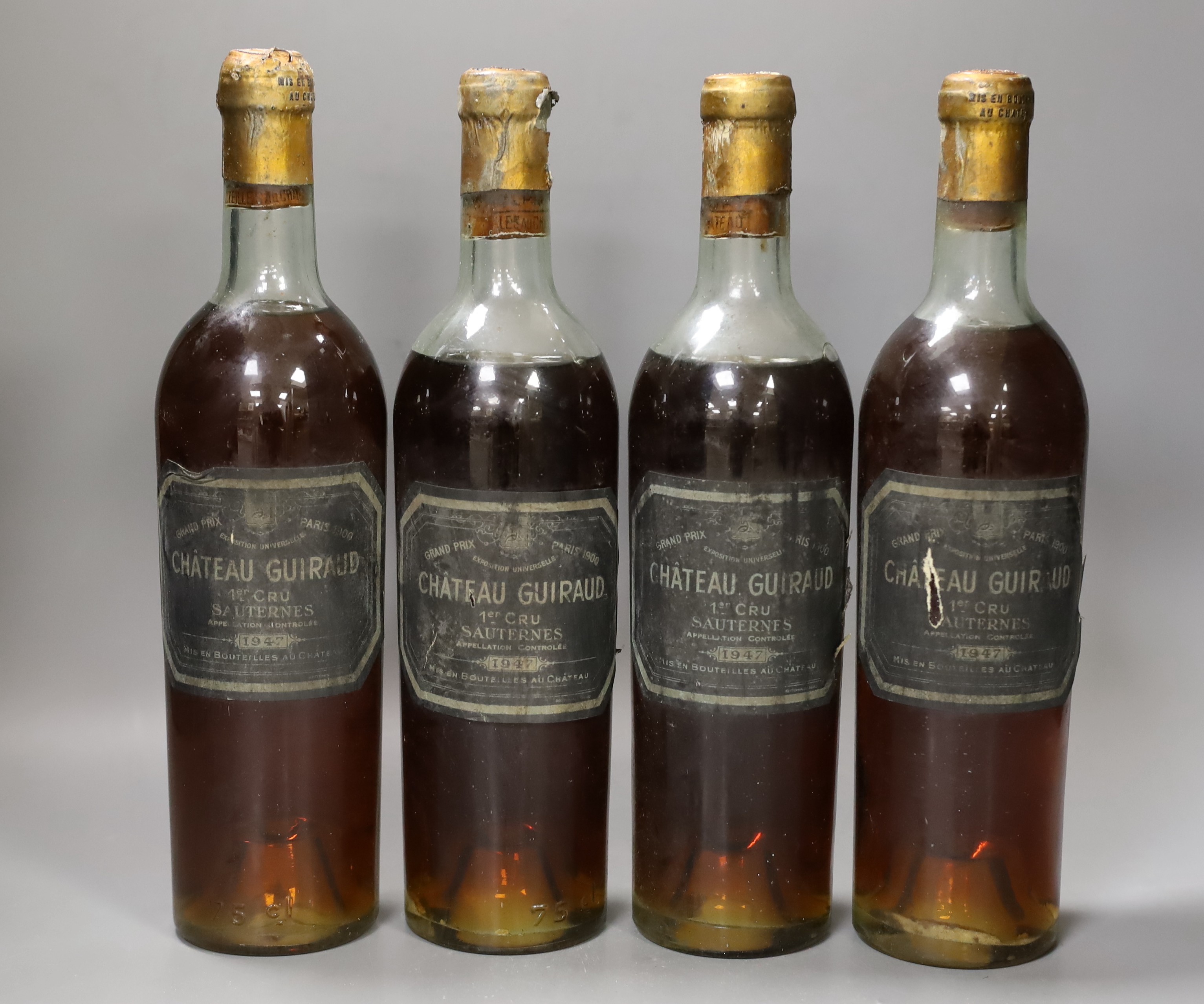 Four bottles of 1947 Chateau Guirard